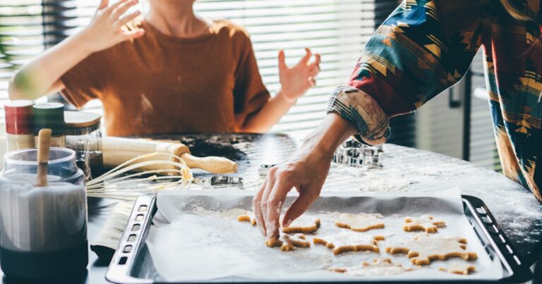 family cooking christmas cookies